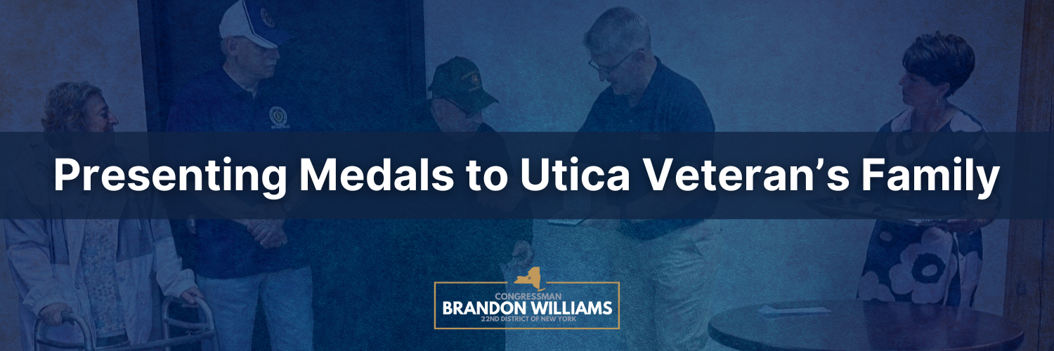 Rep. Williams presents medals to the family of a Utica WWII veteran